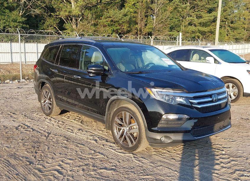 2016 Honda Pilot TOURING (VIN 5FNYF5H94GB037310) main photo