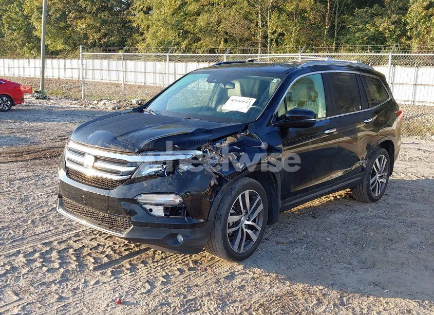 Photo 2 of 2016 Honda Pilot TOURING (VIN 5FNYF5H94GB037310)