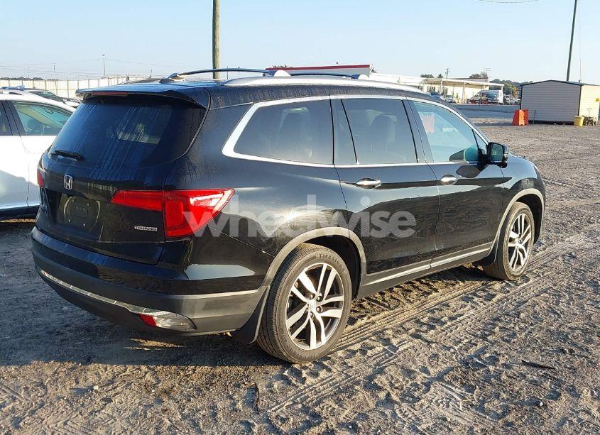Photo 4 of 2016 Honda Pilot TOURING (VIN 5FNYF5H94GB037310)