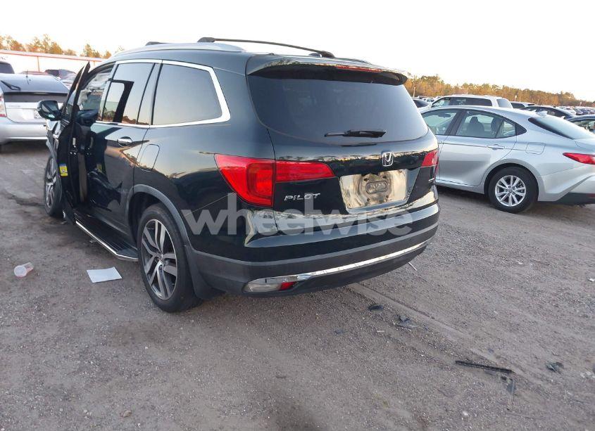 Photo 3 of 2016 Honda Pilot TOURING (VIN 5FNYF5H94GB041356)