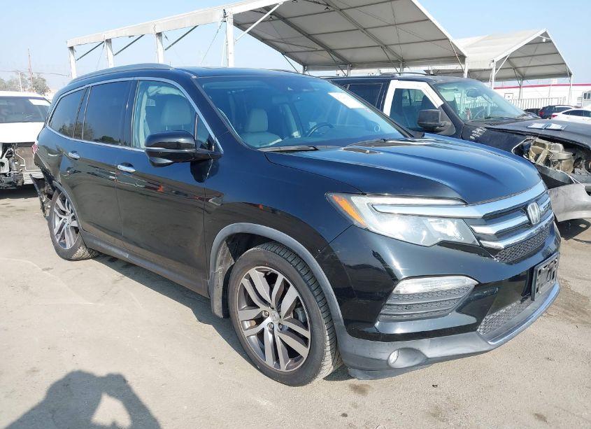 2016 Honda Pilot TOURING (VIN 5FNYF5H95GB005885) main photo