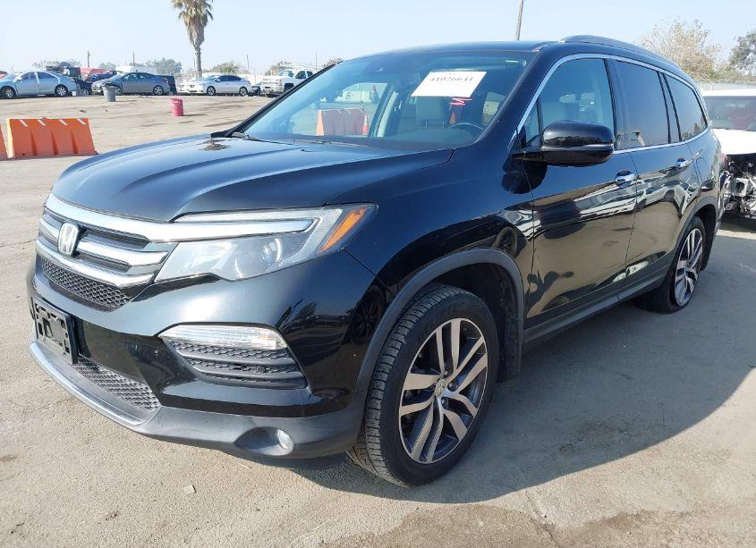 Photo 2 of 2016 Honda Pilot TOURING (VIN 5FNYF5H95GB005885)