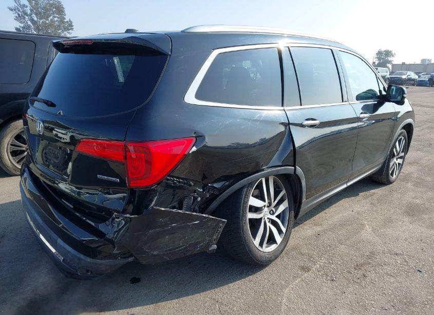 Photo 4 of 2016 Honda Pilot TOURING (VIN 5FNYF5H95GB005885)