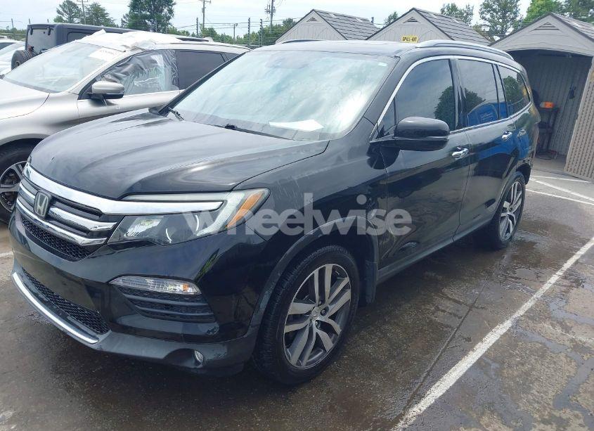 Photo 2 of 2016 Honda Pilot TOURING (VIN 5FNYF5H95GB013971)