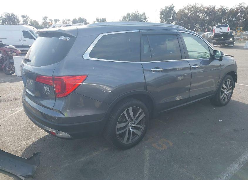 Photo 4 of 2016 Honda Pilot TOURING (VIN 5FNYF5H95GB050907)