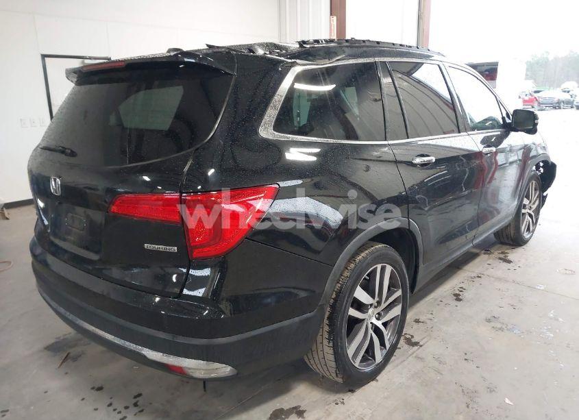 Photo 4 of 2016 Honda Pilot TOURING (VIN 5FNYF5H95GB053323)