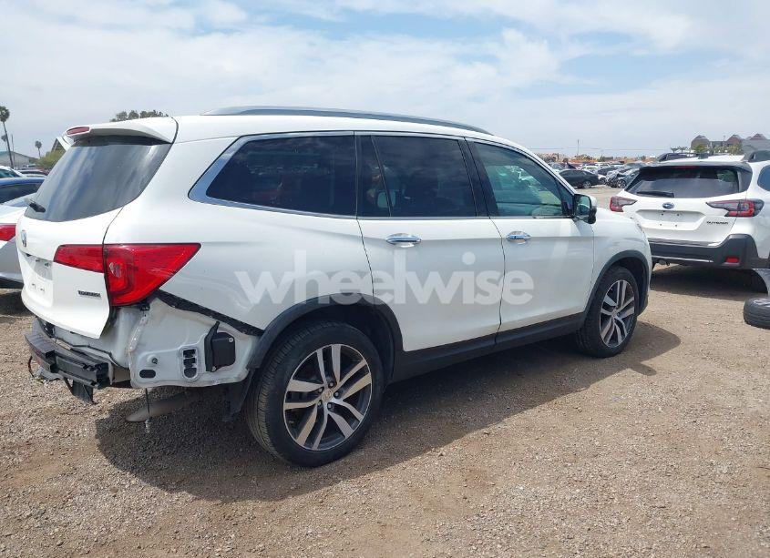 Photo 4 of 2017 Honda Pilot TOURING (VIN 5FNYF5H95HB042632)