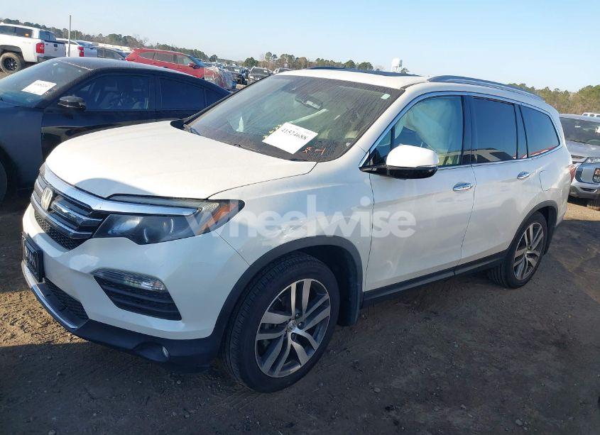 Photo 2 of 2016 Honda Pilot TOURING (VIN 5FNYF5H96GB036210)