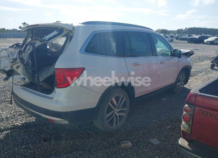 Photo 4 of 2018 Honda Pilot TOURING (VIN 5FNYF5H96JB000878)