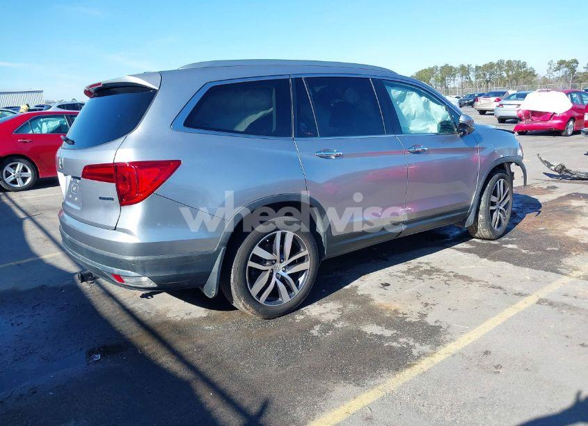 Photo 4 of 2016 Honda Pilot TOURING (VIN 5FNYF5H97GB026379)