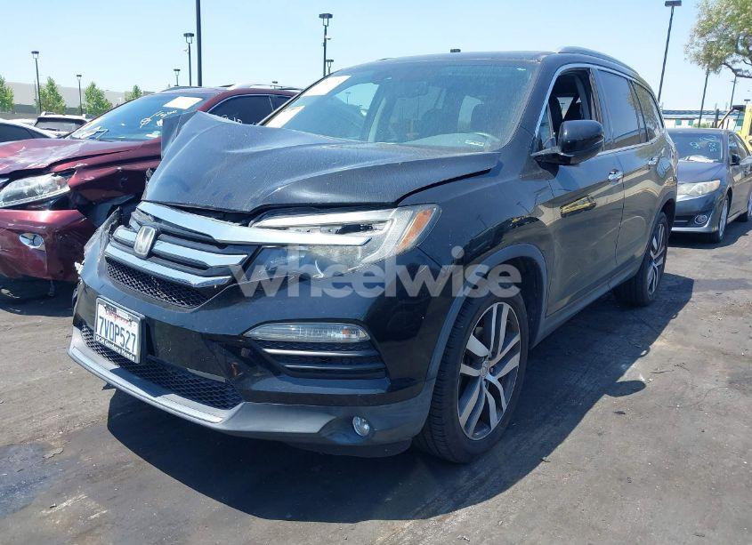 Photo 2 of 2016 Honda Pilot TOURING (VIN 5FNYF5H97GB055929)