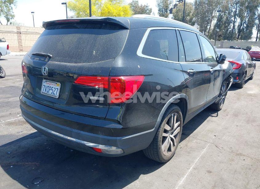 Photo 4 of 2016 Honda Pilot TOURING (VIN 5FNYF5H97GB055929)