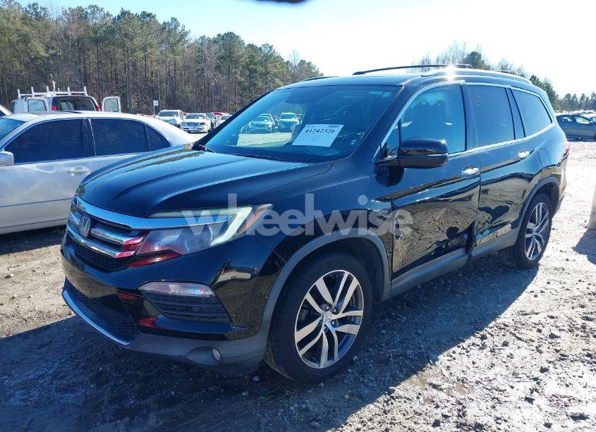 Photo 2 of 2016 Honda Pilot TOURING (VIN 5FNYF5H98GB001300)