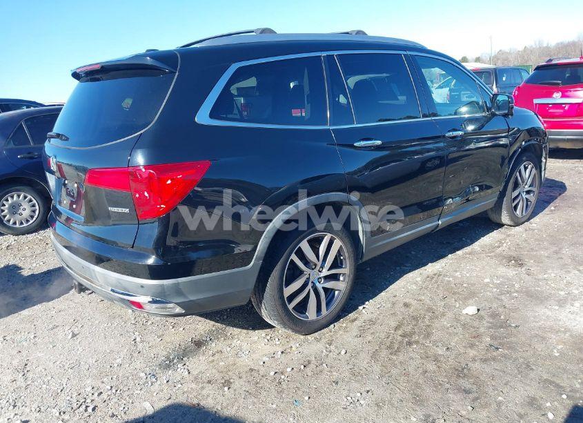 Photo 4 of 2016 Honda Pilot TOURING (VIN 5FNYF5H98GB001300)