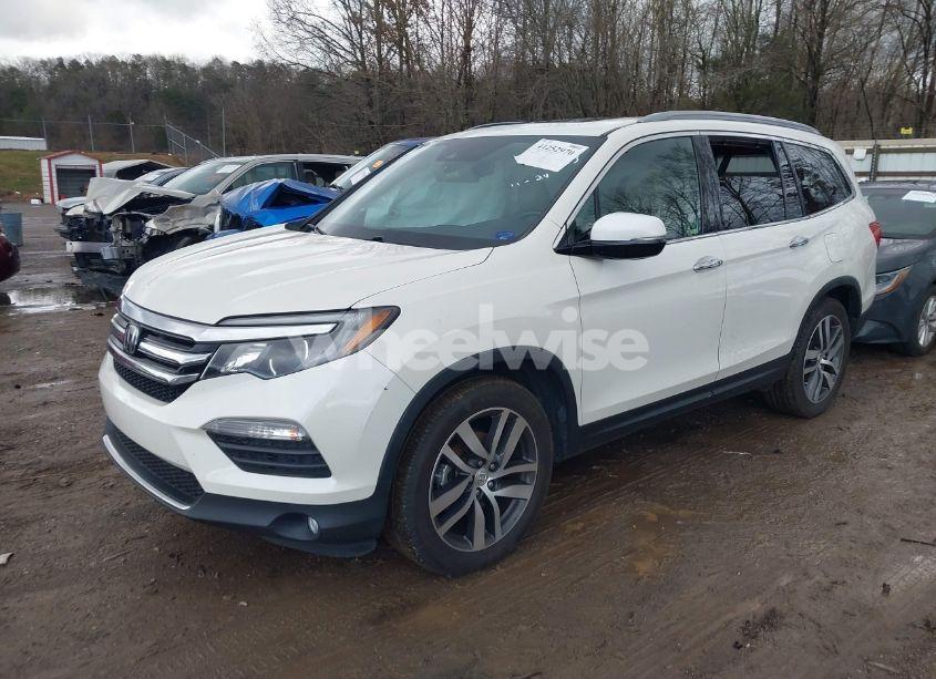 Photo 2 of 2016 Honda Pilot TOURING (VIN 5FNYF5H99GB013343)
