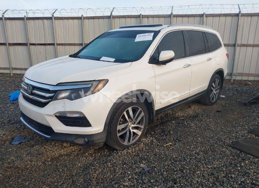 Photo 2 of 2016 Honda Pilot TOURING (VIN 5FNYF5H99GB019725)