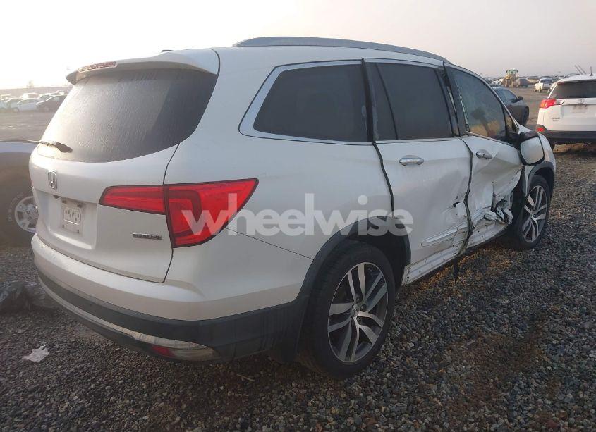 Photo 4 of 2016 Honda Pilot TOURING (VIN 5FNYF5H99GB019725)