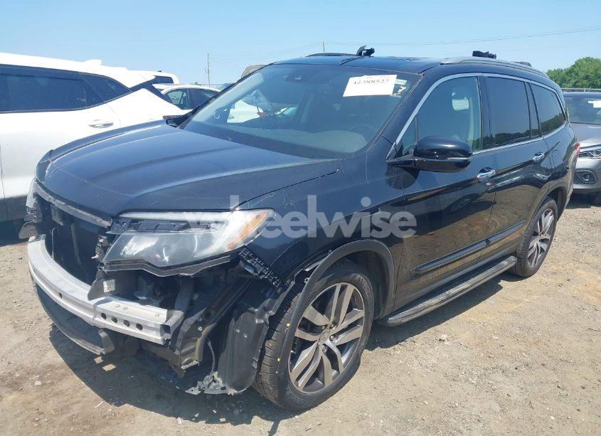 Photo 2 of 2016 Honda Pilot TOURING (VIN 5FNYF5H99GB026352)