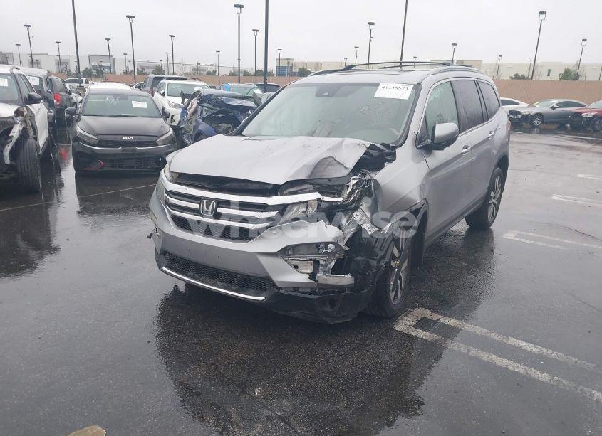 Photo 2 of 2016 Honda Pilot TOURING (VIN 5FNYF5H99GB031082)