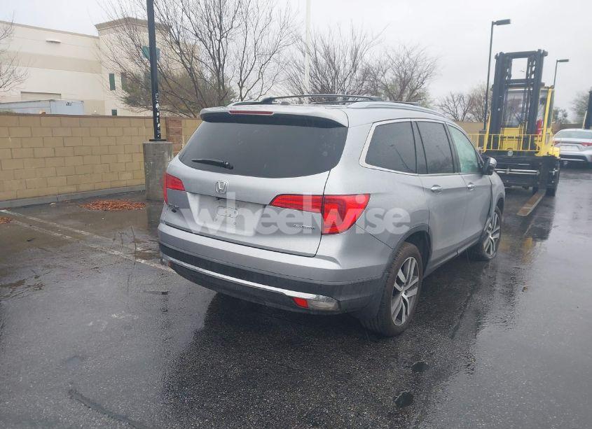 Photo 4 of 2016 Honda Pilot TOURING (VIN 5FNYF5H99GB031082)