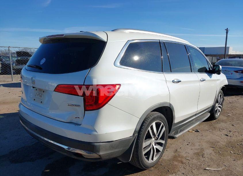 Photo 4 of 2016 Honda Pilot TOURING (VIN 5FNYF5H9XGB008569)