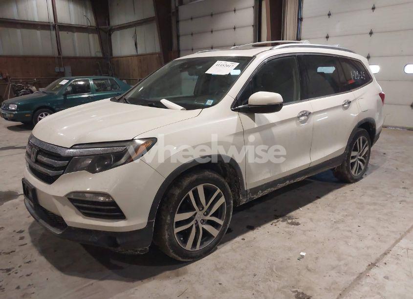 Photo 2 of 2016 Honda Pilot ELITE (VIN 5FNYF6H02GB052864)