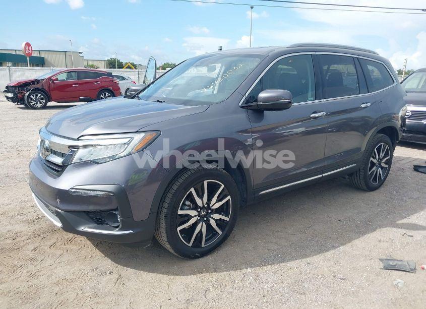 Photo 2 of 2022 Honda Pilot AWD ELITE (VIN 5FNYF6H04NB025212)