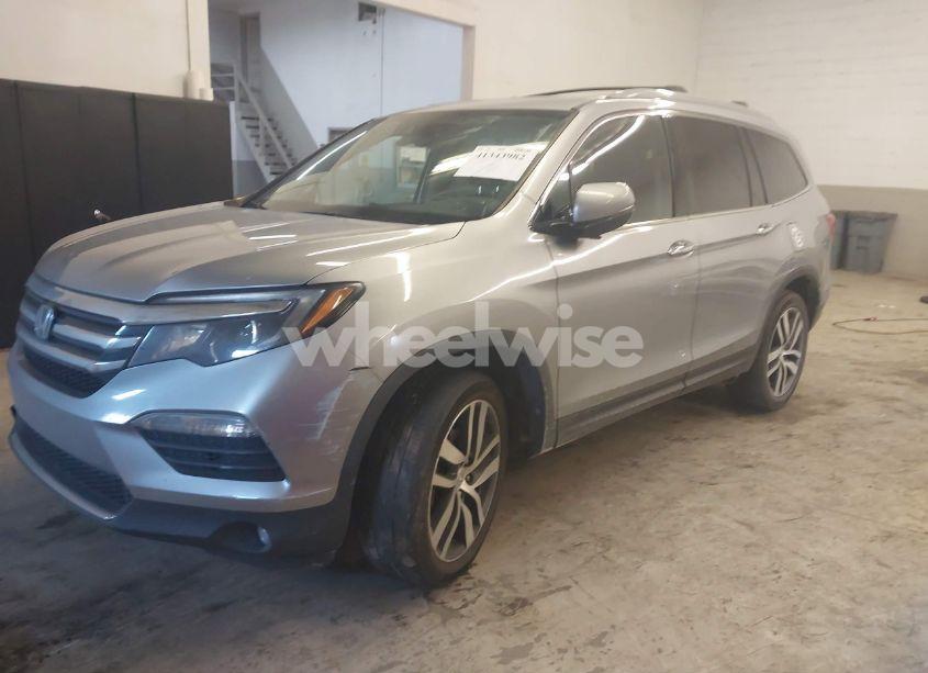 Photo 2 of 2016 Honda Pilot ELITE (VIN 5FNYF6H05GB102320)