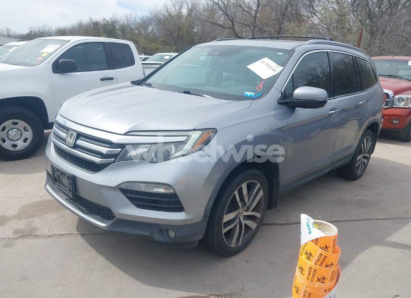 Photo 2 of 2017 Honda Pilot ELITE (VIN 5FNYF6H05HB049099)