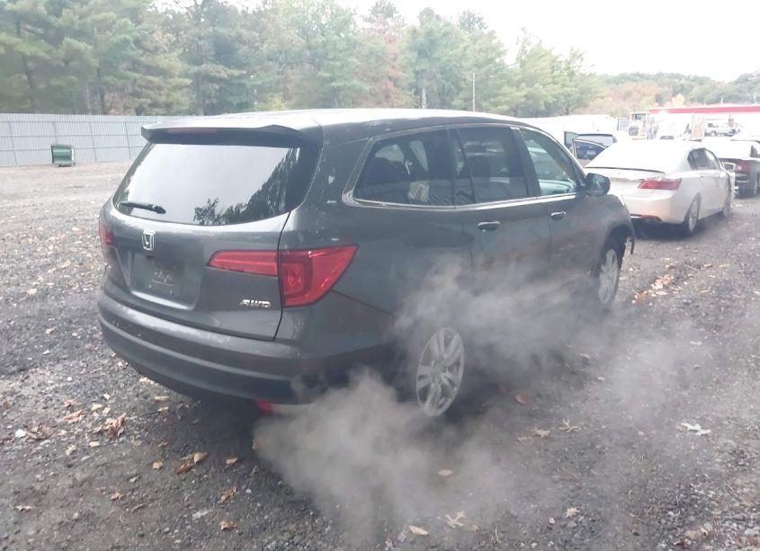 Photo 4 of 2016 Honda Pilot LX (VIN 5FNYF6H10GB045243)