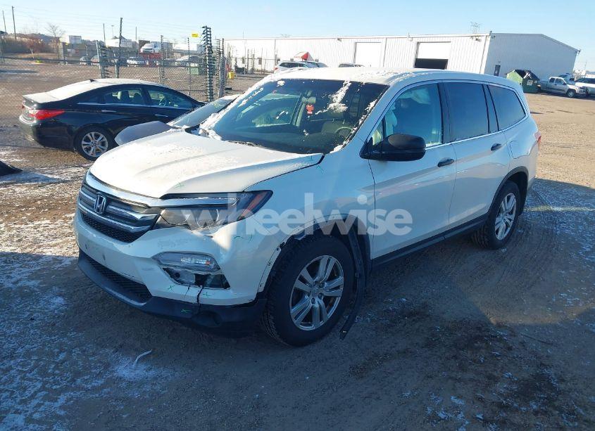 Photo 2 of 2017 Honda Pilot LX (VIN 5FNYF6H10HB040450)