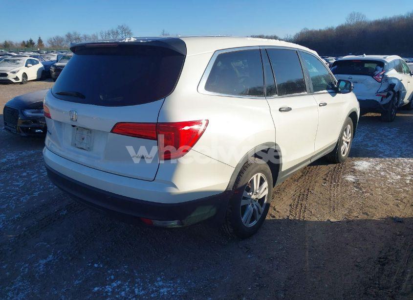 Photo 4 of 2017 Honda Pilot LX (VIN 5FNYF6H10HB040450)