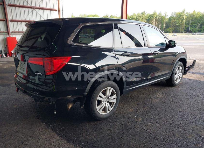 Photo 4 of 2017 Honda Pilot LX (VIN 5FNYF6H10HB088465)