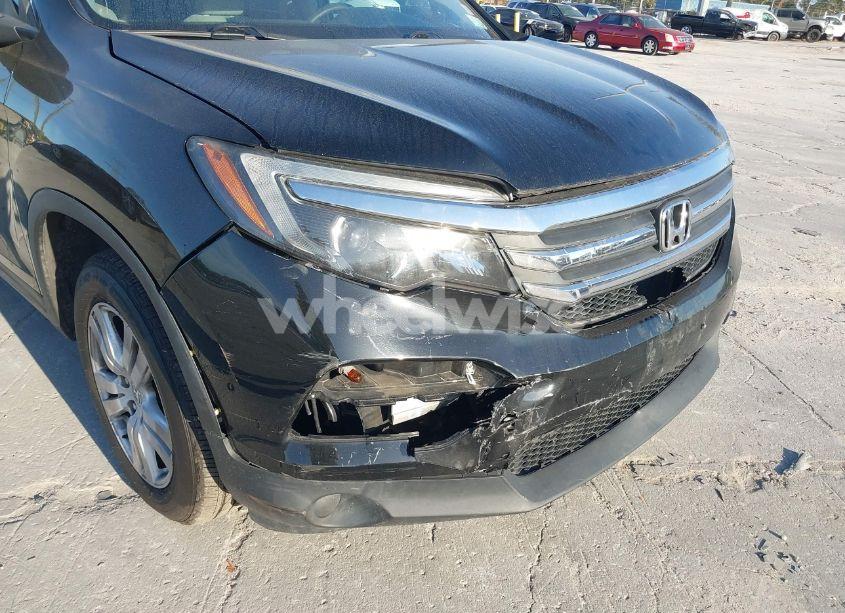Photo 6 of 2018 Honda Pilot LX (VIN 5FNYF6H15JB054172)
