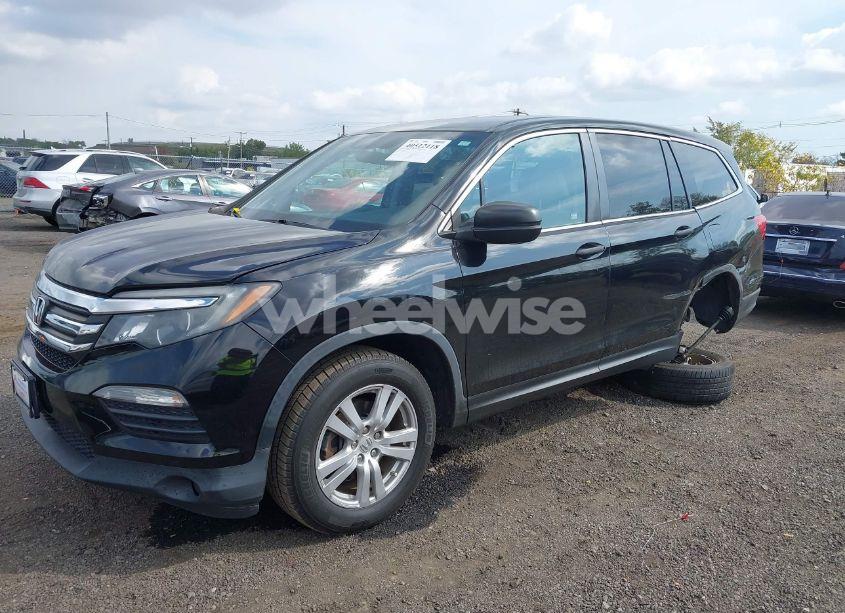 Photo 2 of 2016 Honda Pilot LX (VIN 5FNYF6H16GB095208)