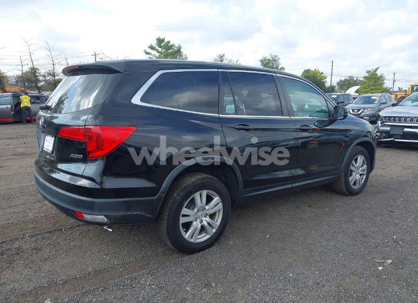 Photo 4 of 2016 Honda Pilot LX (VIN 5FNYF6H16GB095208)