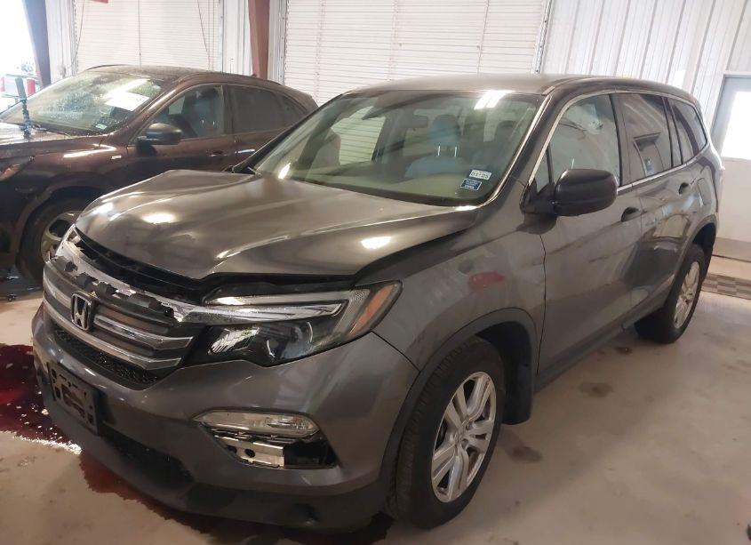 Photo 2 of 2017 Honda Pilot LX (VIN 5FNYF6H17HB016839)