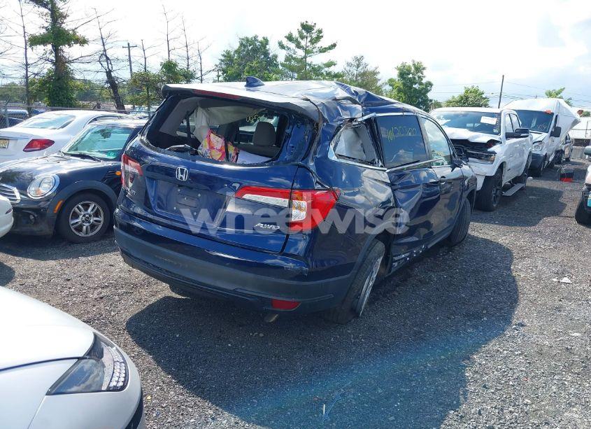 Photo 4 of 2019 Honda Pilot LX (VIN 5FNYF6H19KB077231)