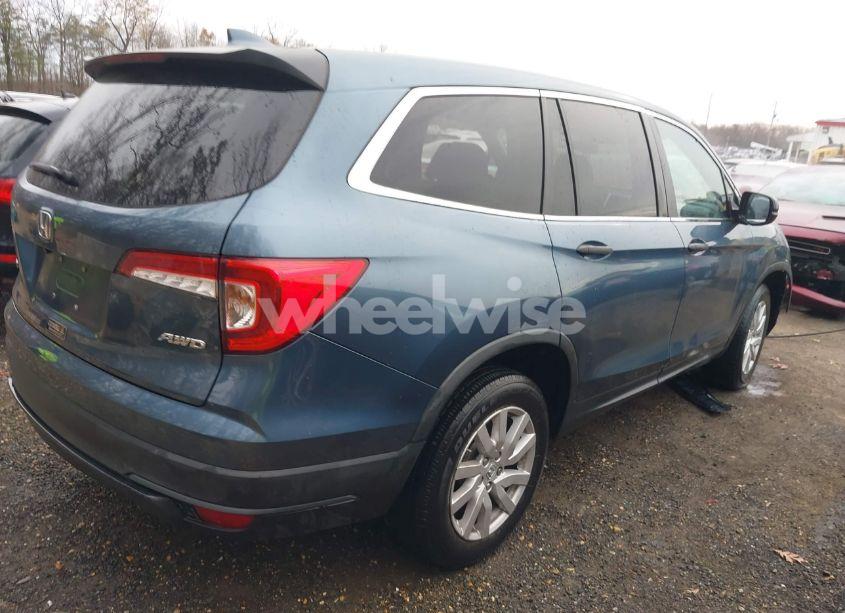 Photo 4 of 2019 Honda Pilot LX (VIN 5FNYF6H19KB095647)