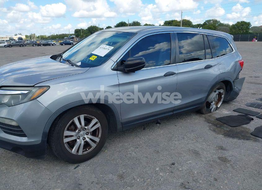 Photo 2 of 2016 Honda Pilot LX (VIN 5FNYF6H1XGB099987)
