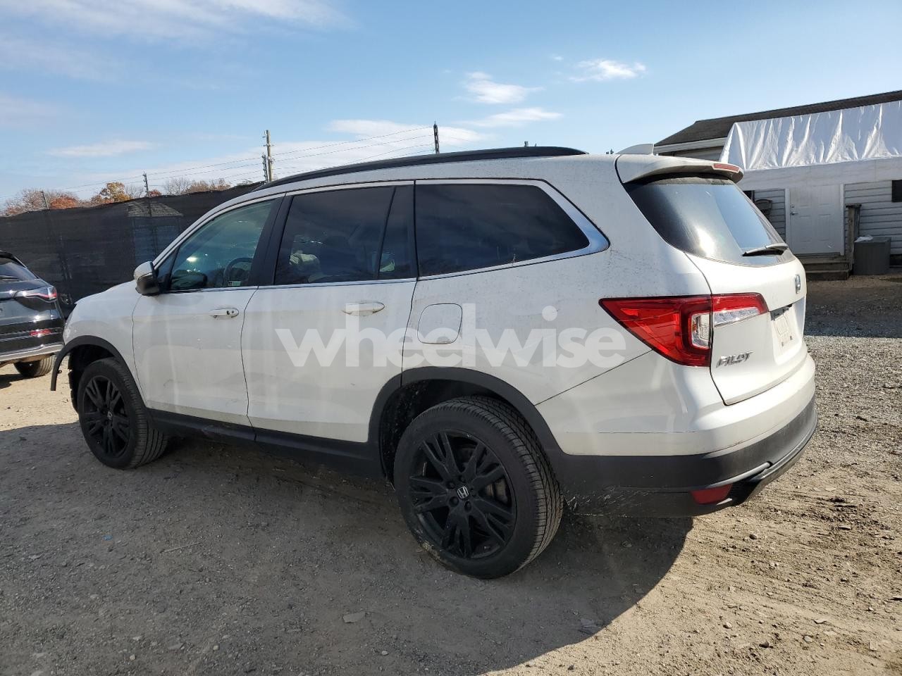 Photo 2 of 2022 HONDA PILOT SE (VIN 5FNYF6H20NB074036)