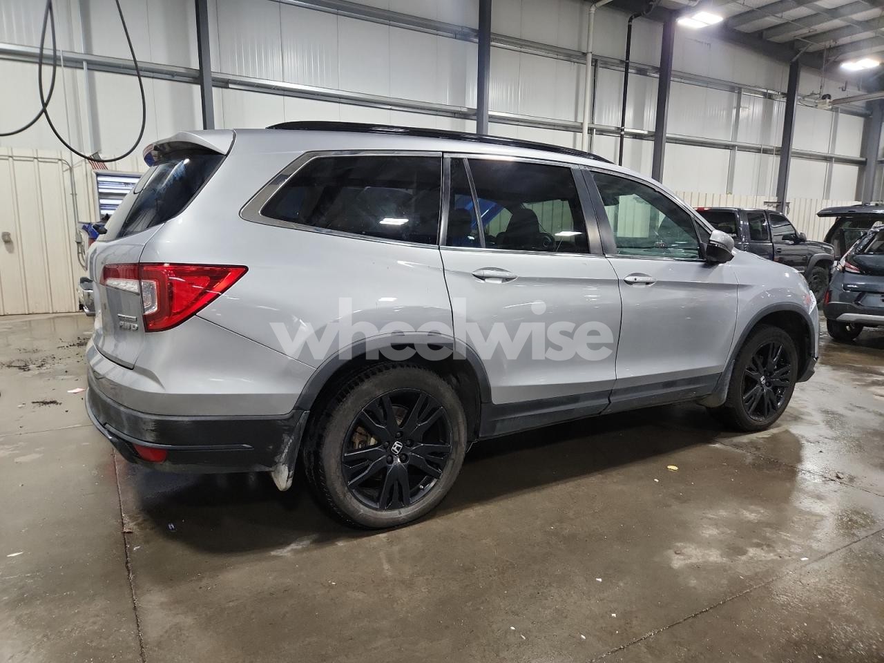 Photo 3 of 2022 HONDA PILOT SE (VIN 5FNYF6H26NB086756)