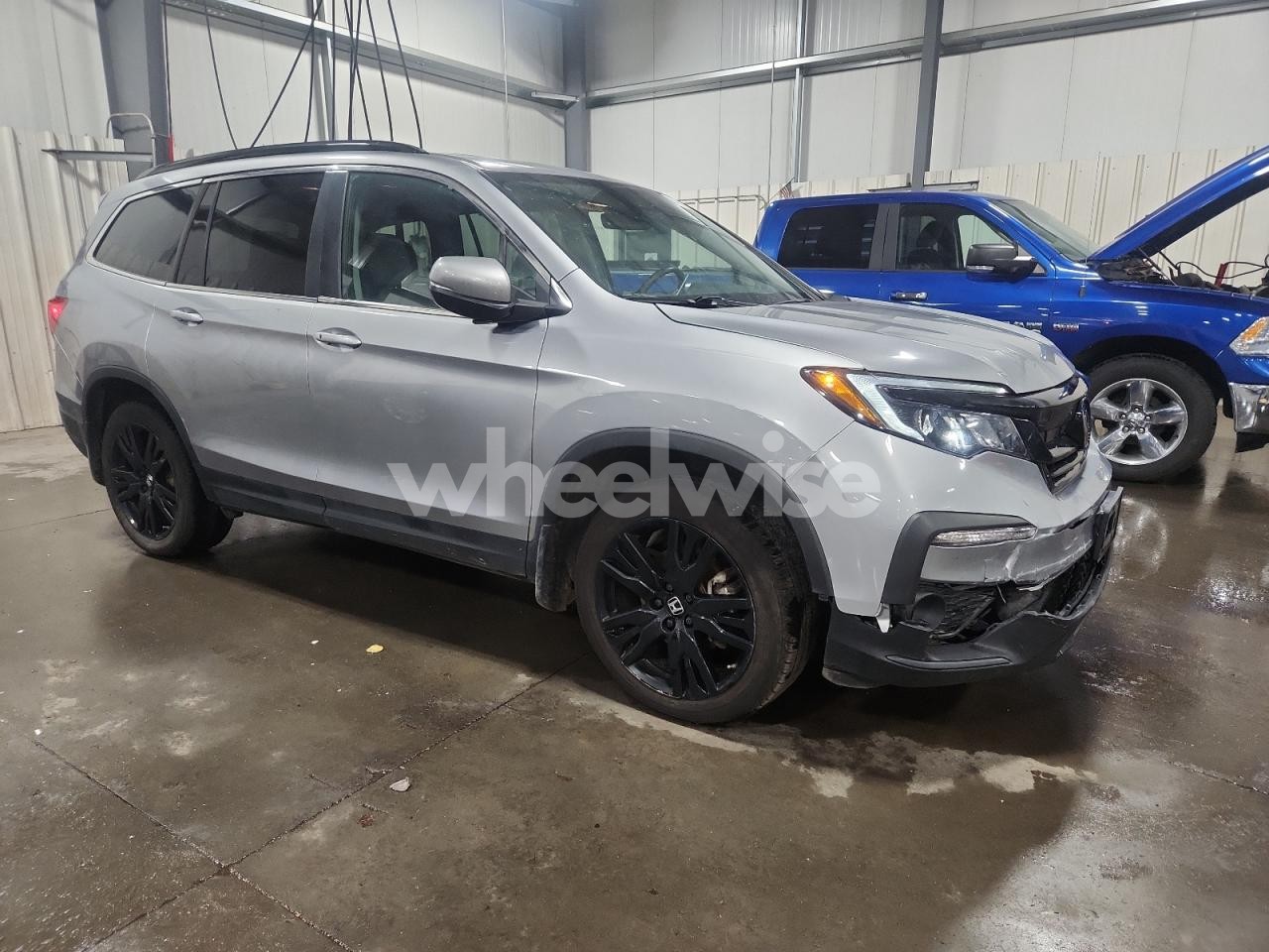 Photo 4 of 2022 HONDA PILOT SE (VIN 5FNYF6H26NB086756)