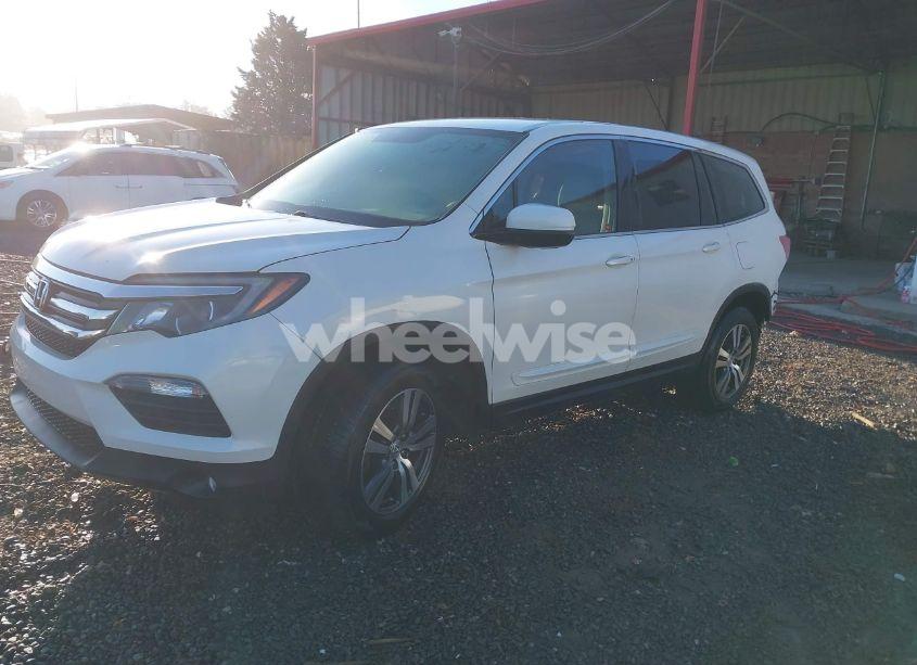 Photo 2 of 2016 Honda Pilot EX (VIN 5FNYF6H39GB003266)