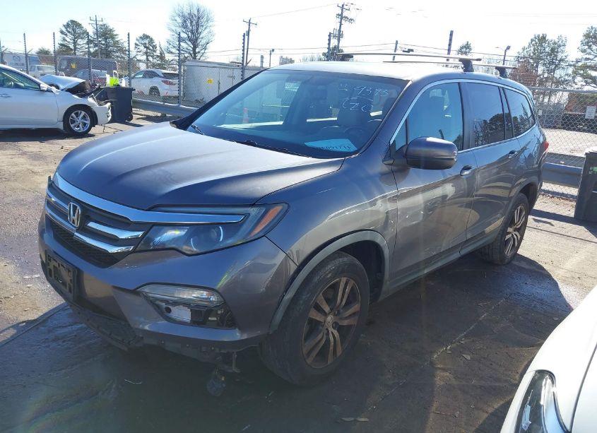 Photo 2 of 2016 Honda Pilot EX-L (VIN 5FNYF6H50GB009393)