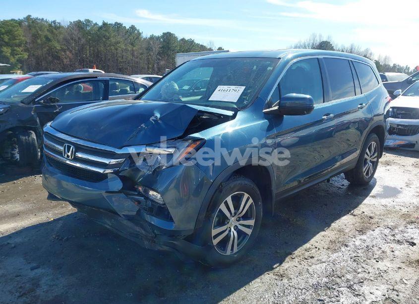 Photo 2 of 2018 Honda Pilot EX-L (VIN 5FNYF6H50JB025276)