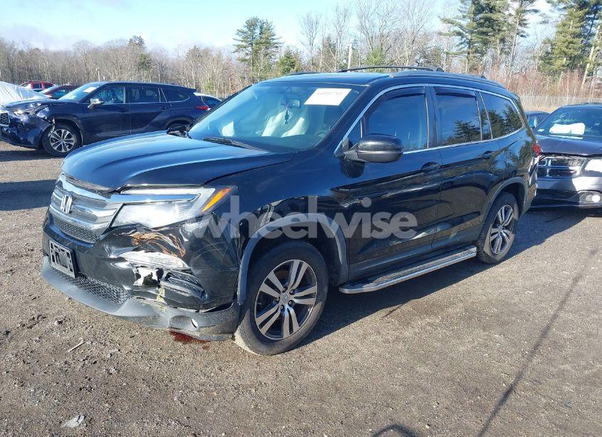 Photo 2 of 2017 Honda Pilot EX-L (VIN 5FNYF6H51HB038628)