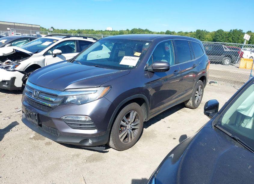 Photo 2 of 2016 Honda Pilot EX-L (VIN 5FNYF6H52GB090994)