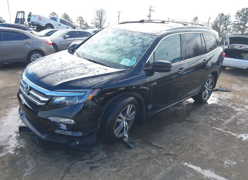 Photo 2 of 2017 Honda Pilot EX-L (VIN 5FNYF6H52HB033874)