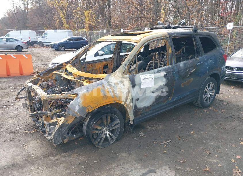 Photo 2 of 2017 Honda Pilot EX-L (VIN 5FNYF6H52HB050660)